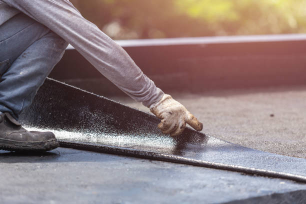 Professional Waterproofing technician working in Hebron, KY